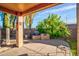 Outdoor patio with built-in BBQ and seating area at 8903 N 57Th Dr, Glendale, AZ 85302
