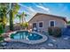 Relaxing kidney-shaped pool surrounded by landscaping at 8903 N 57Th Dr, Glendale, AZ 85302
