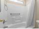 Bathroom with shower/tub combo and grab bars at 1102 N 5Th St, Buckeye, AZ 85326