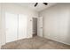 Spacious bedroom with double door closet and neutral walls at 1102 N 5Th St, Buckeye, AZ 85326