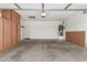 Attached garage with storage cabinets and extra space at 1102 N 5Th St, Buckeye, AZ 85326