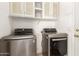 Laundry room with washer and dryer included at 1102 N 5Th St, Buckeye, AZ 85326
