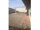 Spacious backyard featuring a covered patio and low-maintenance landscaping, ideal for relaxation and entertaining at 1449 W Mohawk Ln, Phoenix, AZ 85027