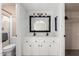 Bright bathroom with double vanity and a shower at 1449 W Mohawk Ln, Phoenix, AZ 85027