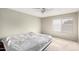 Comfortable bedroom with carpeted floors and a ceiling fan at 1449 W Mohawk Ln, Phoenix, AZ 85027