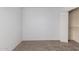 Empty bedroom with closet and carpeting at 1449 W Mohawk Ln, Phoenix, AZ 85027