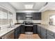 Modern kitchen featuring stainless steel appliances and ample counter space at 1449 W Mohawk Ln, Phoenix, AZ 85027