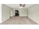 Bright living area with neutral walls and carpeting, offering a formal entryway at 1449 W Mohawk Ln, Phoenix, AZ 85027
