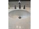 Modern bathroom sink with chrome fixtures and quartz countertop at 1545 W Berridge Ln, Phoenix, AZ 85015