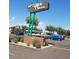 Uptown Plaza shopping center signage and parking lot at 1545 W Berridge Ln, Phoenix, AZ 85015