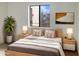Cozy bedroom with wood bed frame and two night stands at 16635 N Cave Creek Rd # 228, Phoenix, AZ 85032