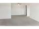 Bright living room with carpeted floors and ceiling fan at 16635 N Cave Creek Rd # 228, Phoenix, AZ 85032