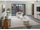 Bright living room with comfy seating and access to patio at 16635 N Cave Creek Rd # 228, Phoenix, AZ 85032