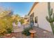 Desert landscape backyard with patio and seating area at 18208 W Skyline Dr, Surprise, AZ 85374