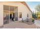 Landscaped backyard with patio and screened enclosure at 18208 W Skyline Dr, Surprise, AZ 85374