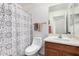 Simple bathroom with shower/tub combo and wood vanity at 18208 W Skyline Dr, Surprise, AZ 85374