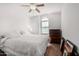 Bright bedroom with a double bed and wood dresser at 18208 W Skyline Dr, Surprise, AZ 85374