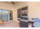 Patio with built-in grill and seating area at 18208 W Skyline Dr, Surprise, AZ 85374