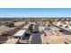 Aerial view showing community pool and homes at 1920 S Plaza Dr # 26, Apache Junction, AZ 85120