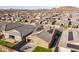 Aerial view of house with solar panels and backyard at 2033 W Burnside Trl, Phoenix, AZ 85085