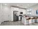 Modern kitchen with stainless steel appliances and an island at 2033 W Burnside Trl, Phoenix, AZ 85085