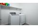 Laundry room with washer, dryer and shelving at 2033 W Burnside Trl, Phoenix, AZ 85085