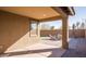 Covered patio with paver stones and a small seating area at 2033 W Burnside Trl, Phoenix, AZ 85085