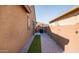Side yard with gravel, artificial turf, and gate at 2033 W Burnside Trl, Phoenix, AZ 85085