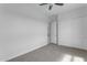 Spacious bedroom with double door closet and carpet flooring at 24301 N 194Th Ave, Surprise, AZ 85387