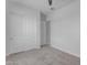 Bedroom with double door closet and grey carpet at 24301 N 194Th Ave, Surprise, AZ 85387