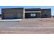 Two-car garage and desert landscaping surround this one-story home at 24301 N 194Th Ave, Surprise, AZ 85387