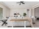 Bright and airy living room with neutral color palette and large windows at 24301 N 194Th Ave, Surprise, AZ 85387
