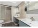 Updated bathroom with a walk-in shower and mosaic tile at 2609 S Country Club Way, Tempe, AZ 85282