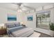 Bright bedroom with large window and double bed at 2609 S Country Club Way, Tempe, AZ 85282