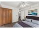 Bedroom with large closet and ensuite bathroom at 2609 S Country Club Way, Tempe, AZ 85282