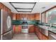 Updated kitchen, stainless steel appliances and double sink at 2609 S Country Club Way, Tempe, AZ 85282