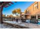 Relaxing backyard with hot tub, pergola, and outdoor kitchen at 2838 E Shady Spring Trl, Phoenix, AZ 85024