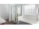 Clean bathroom with a soaking tub, shower, and updated fixtures at 2838 E Shady Spring Trl, Phoenix, AZ 85024