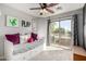 Cozy bedroom with a daybed, sliding door to balcony and playful decor at 2838 E Shady Spring Trl, Phoenix, AZ 85024