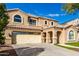 Charming two-story home features a private balcony and a two car garage on a sunny day at 2838 E Shady Spring Trl, Phoenix, AZ 85024
