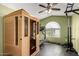 Home gym with a sauna, treadmill, and weight equipment at 2838 E Shady Spring Trl, Phoenix, AZ 85024