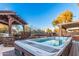 Spacious hot tub with seating and pergola at 2838 E Shady Spring Trl, Phoenix, AZ 85024