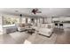 Spacious living room with a large sectional sofa and a view of the backyard at 2838 E Shady Spring Trl, Phoenix, AZ 85024