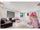 Fun playroom with sectional sofa and play tent at 2838 E Shady Spring Trl, Phoenix, AZ 85024