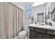 Clean bathroom with a shower/tub combo and modern vanity at 29321 N Horton Creek Trl, Rio Verde, AZ 85263