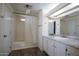 Bathroom boasts a shower/tub combo and modern vanity at 305 S Val Vista Dr # 417, Mesa, AZ 85204