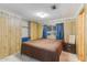 Bedroom with double bed, wood floors and window at 305 S Val Vista Dr # 417, Mesa, AZ 85204