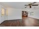 Living room with wood floors and built-in hutch at 305 S Val Vista Dr # 417, Mesa, AZ 85204