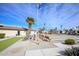 Community shuffleboard and seating area at 305 S Val Vista Dr # 417, Mesa, AZ 85204