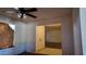 Interior view showing a hallway and ceiling fan at 3054 W Tierra Buena Ln, Phoenix, AZ 85053